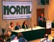 John Morgan at the podium of a Medical Marijuana Panel Discussion